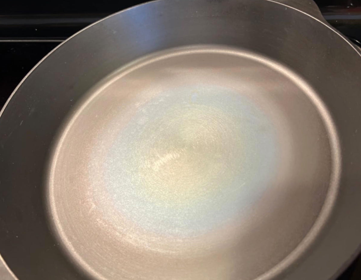 Is It Normal for Pre-Seasoned Cast Iron Skillet/Griddle to Discolor When I Start Using It?